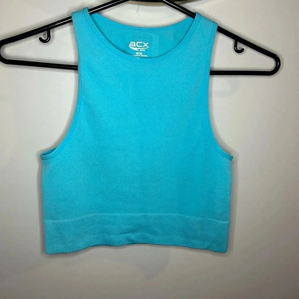 ACX women tops size m but fits more like an xs/s